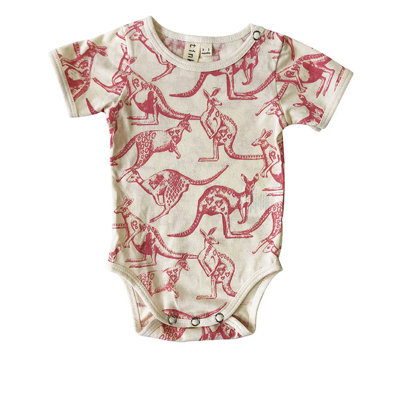 Beige baby romper with pink kangaroo print